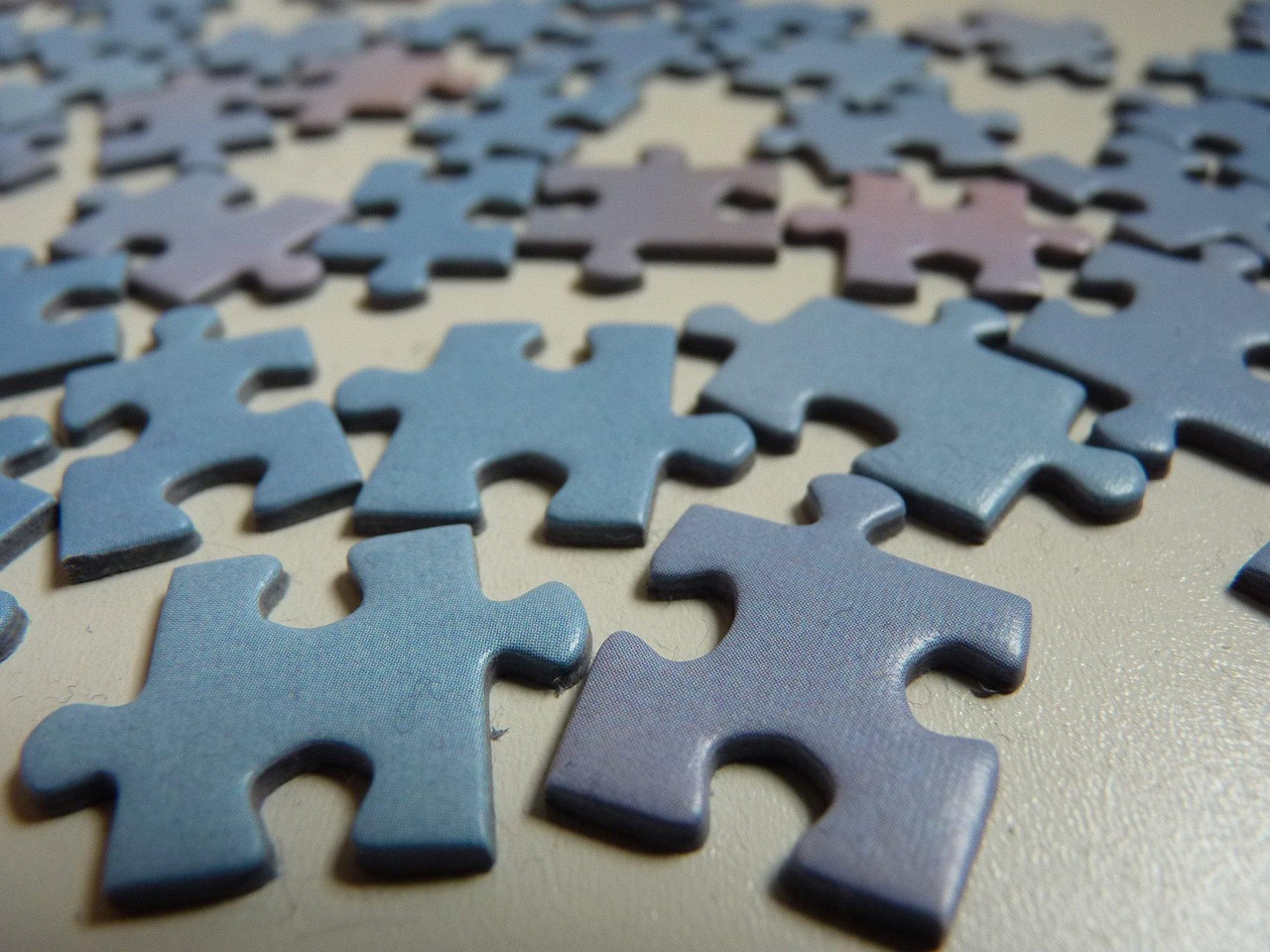 kids hands puzzle pieces
